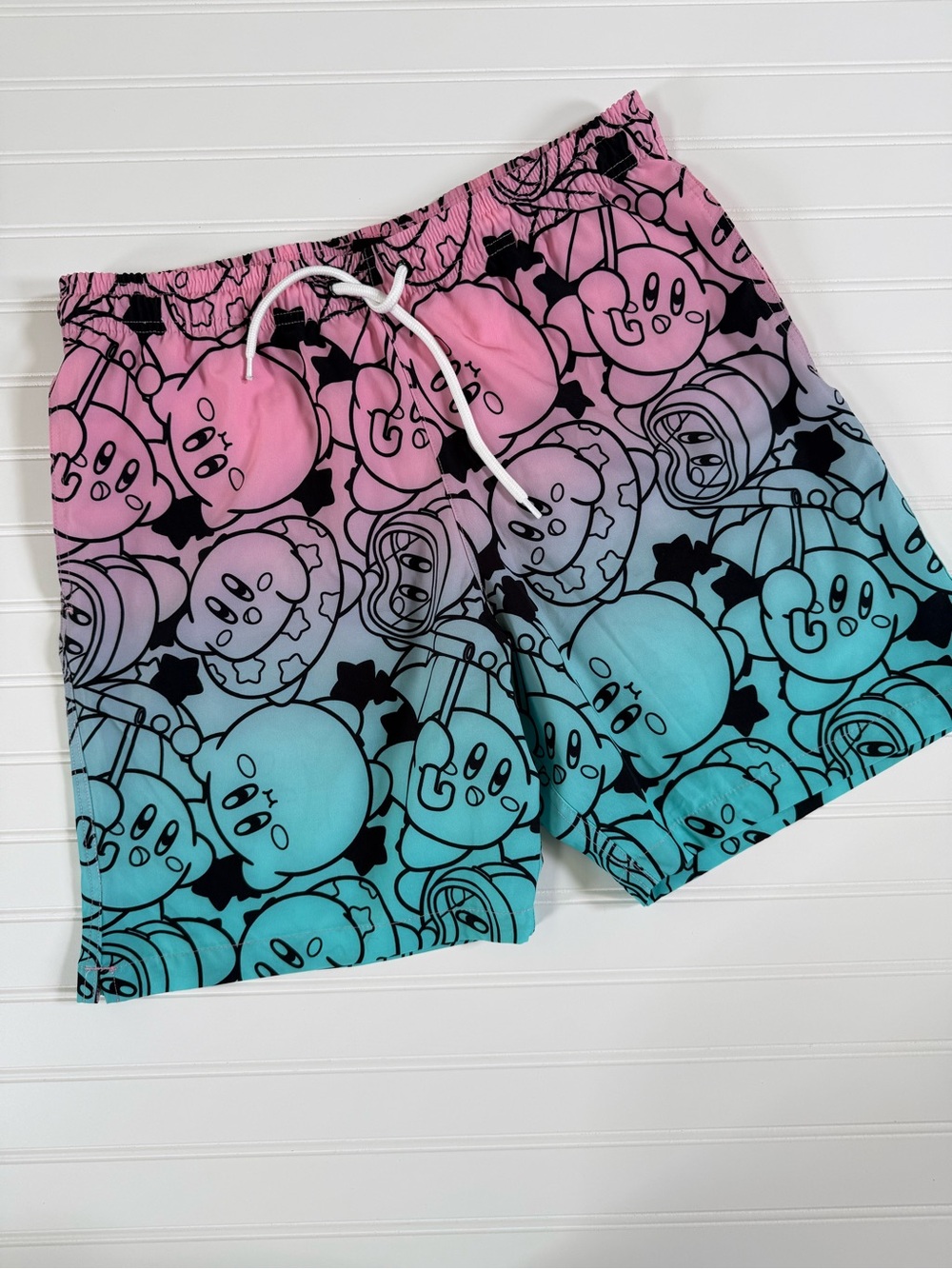 Gradient Pink to Blue Men's Swim Trunks with Playful Kirby Design